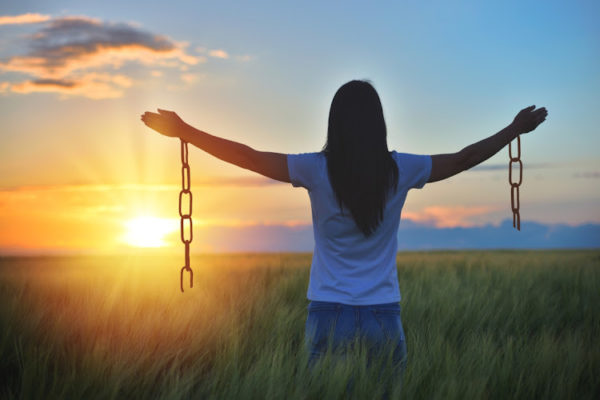 women breaking free from chains freedom
